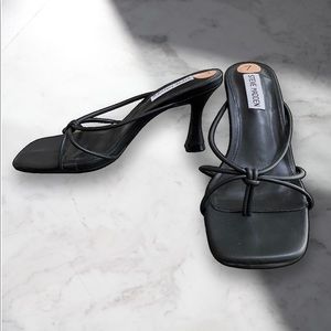 Steve Madden square toe and flared heel sandals.